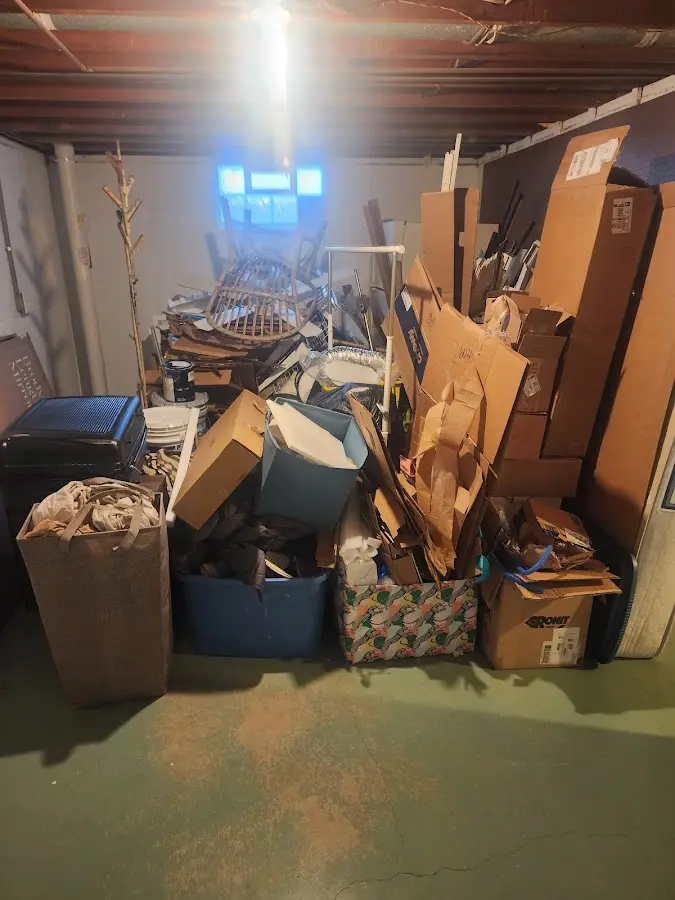 Roll-off dumpster container at job site for 15 Yard Dumpster Rental in Rexburg